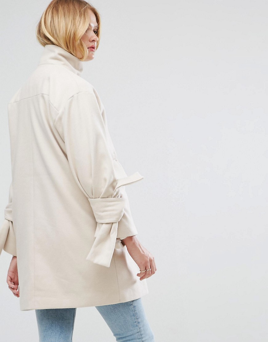 Bezowy-Plaszcz-oversize-rekawy-z-kokardami-XL-42-1 Bezowy-Plaszcz-oversize-rekawy-z-kokardami-XL-42