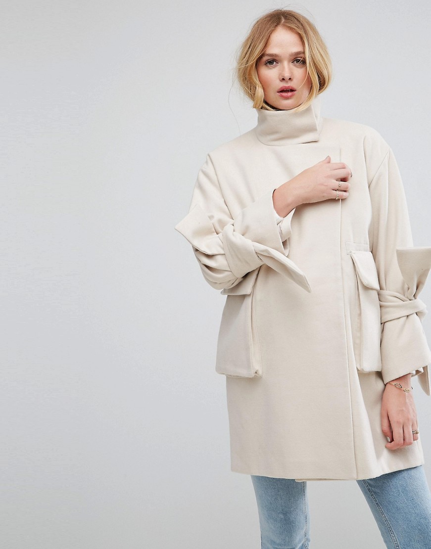 Beżowy Płaszcz oversize rękawy z kokardami XL 42 Bezowy-Plaszcz-oversize-rekawy-z-kokardami-XL-42