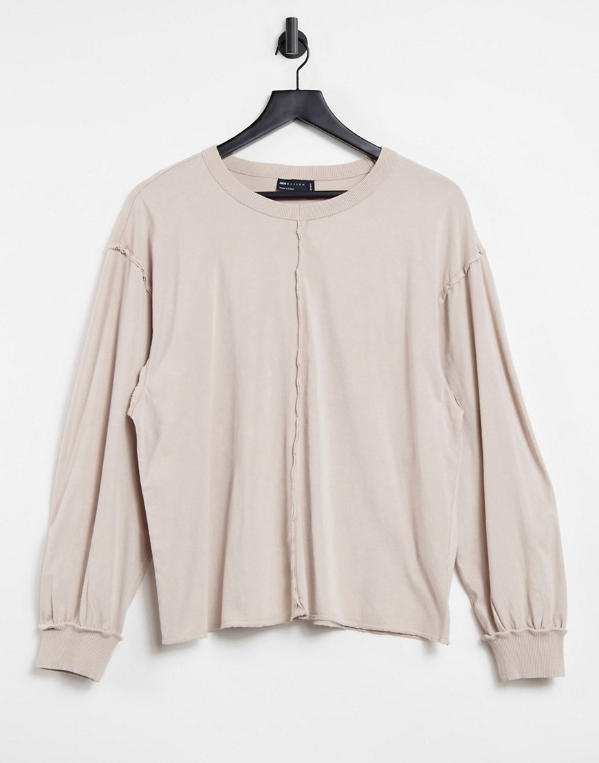 Beżowy t shirt oversize z długimi rękawami z ozdobnymi przeszyciami 42 Bezowy-t-shirt-oversize-z-dlugimi-rekawami-z-ozdobnymi-przeszyciami-42