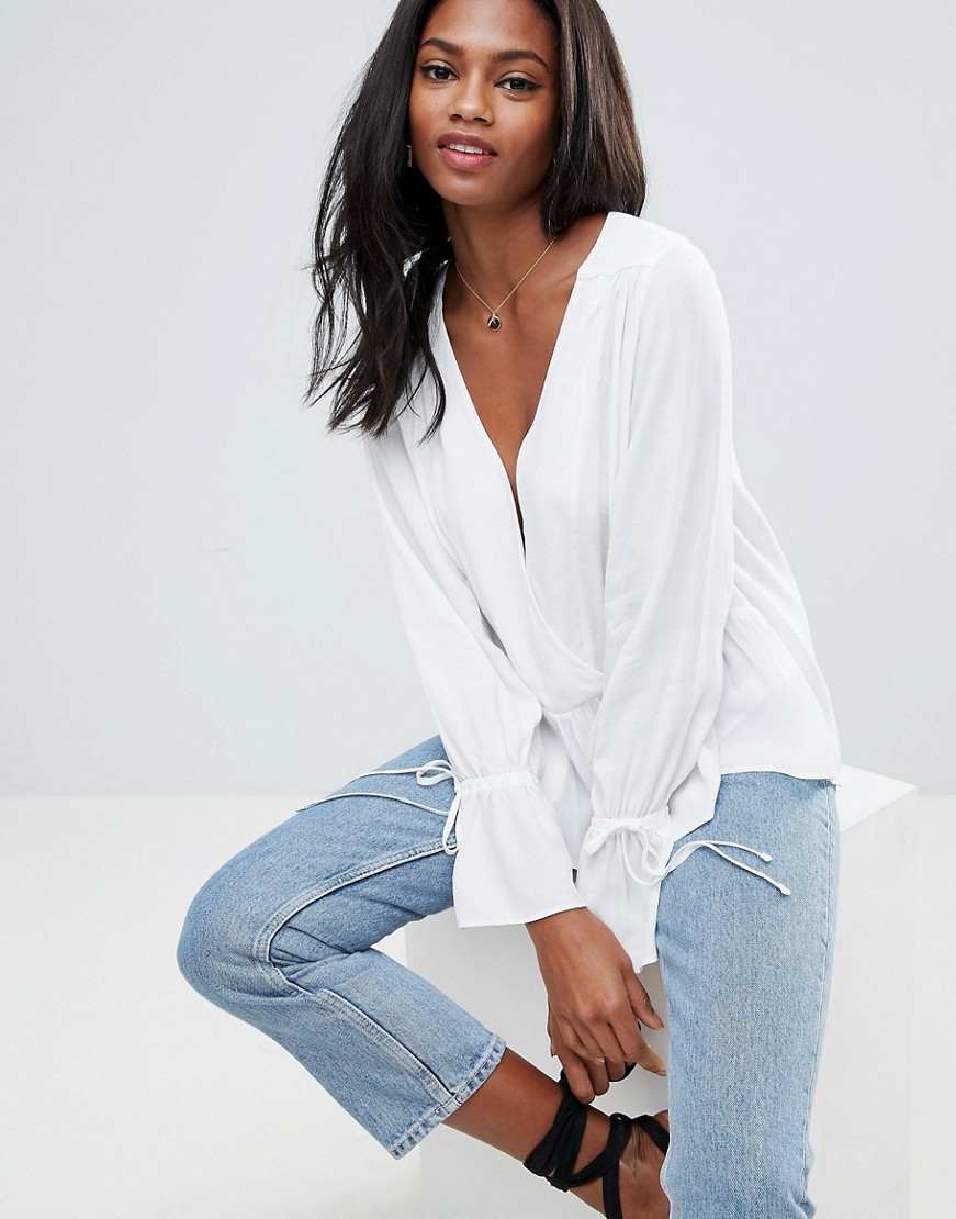 Biala-Bluzka-z-dlugim-rekawem-oversize-XXS-32-1 Biala-Bluzka-z-dlugim-rekawem-oversize-XXS-32