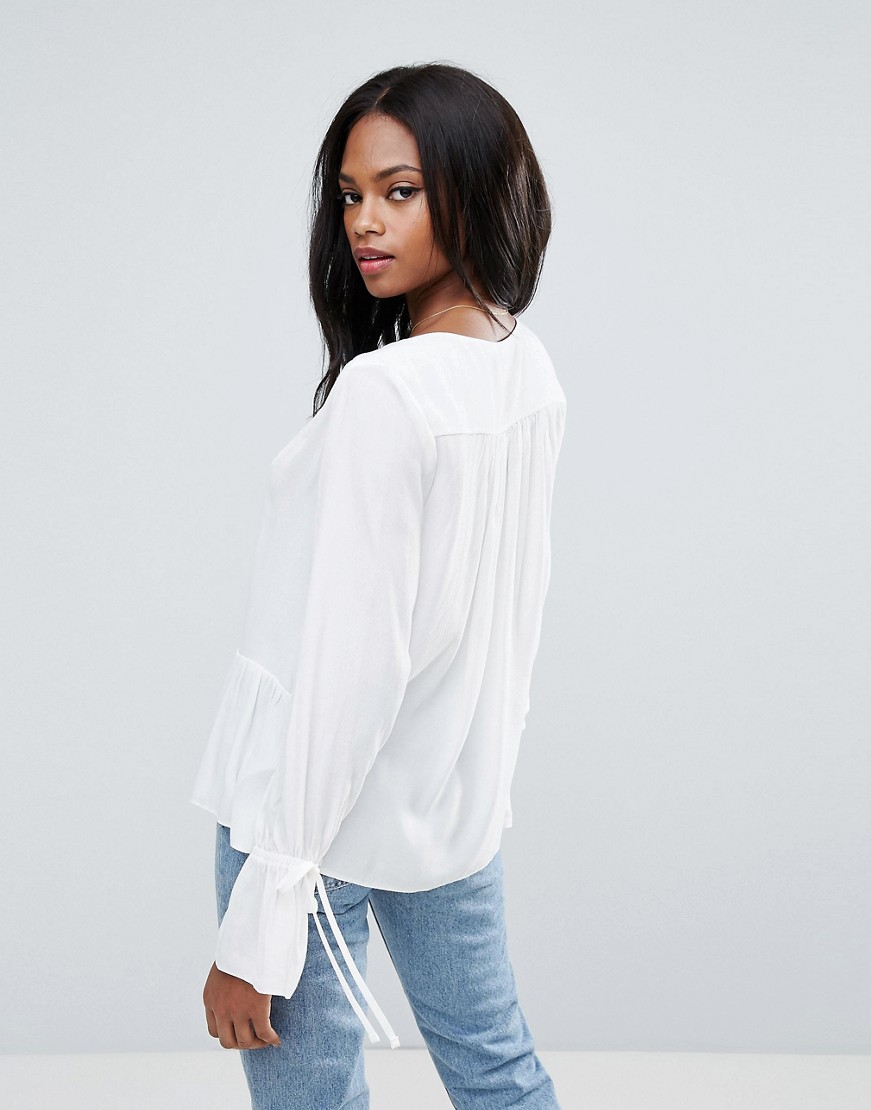 Biala-Bluzka-z-dlugim-rekawem-oversize-XXS-32-2 Biala-Bluzka-z-dlugim-rekawem-oversize-XXS-32