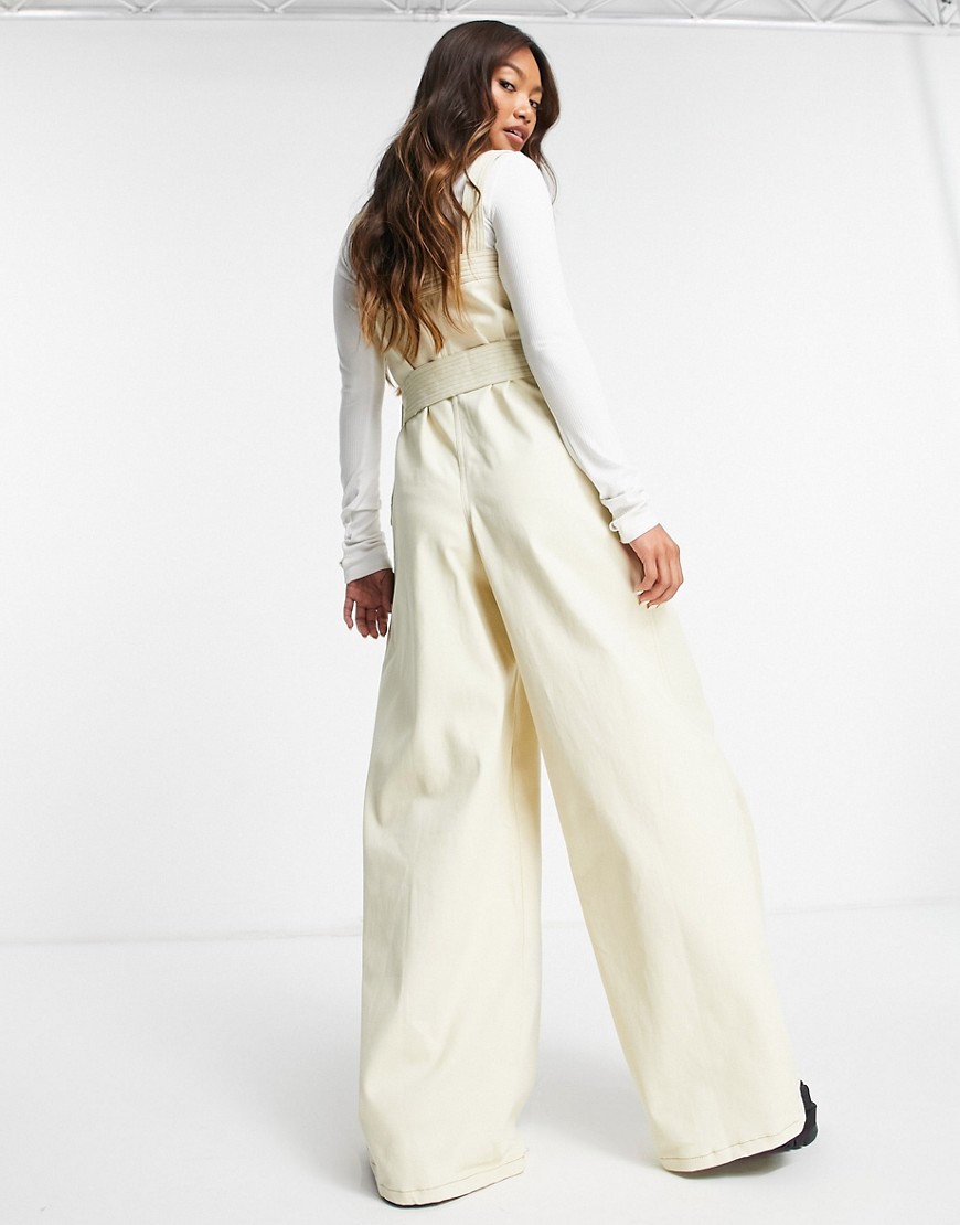 Jasnobezowy-jeansowy-kombinezon-szerokie-nogawki-wide-leg-38-1 Jasnobezowy-jeansowy-kombinezon-szerokie-nogawki-wide-leg-38