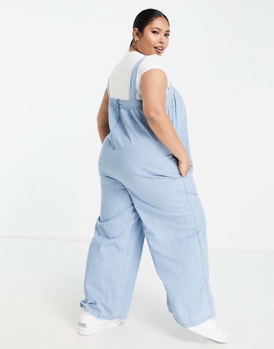 Jasnoniebieski-luzny-kombinezon-z-miekkiego-jeansu-plus-size-54-1 Jasnoniebieski-luzny-kombinezon-z-miekkiego-jeansu-plus-size-54