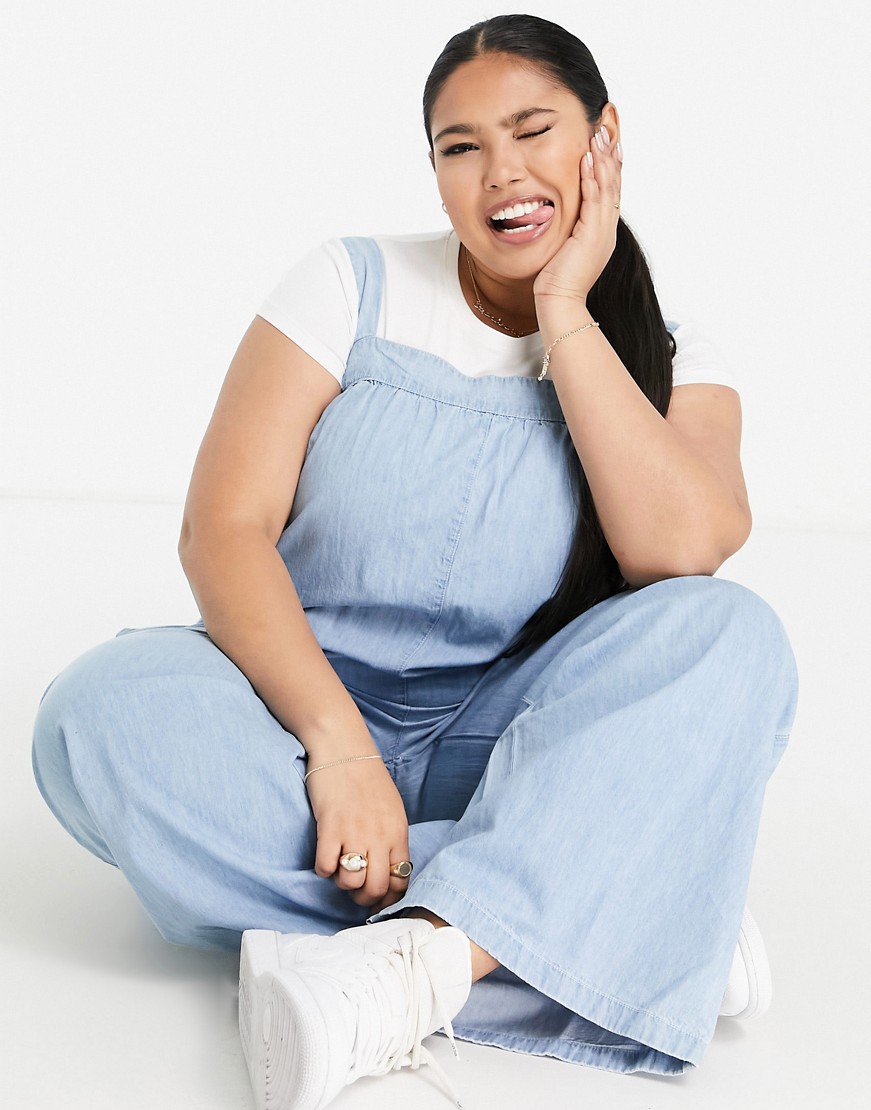 Jasnoniebieski-luzny-kombinezon-z-miekkiego-jeansu-plus-size-54-2 Jasnoniebieski-luzny-kombinezon-z-miekkiego-jeansu-plus-size-54