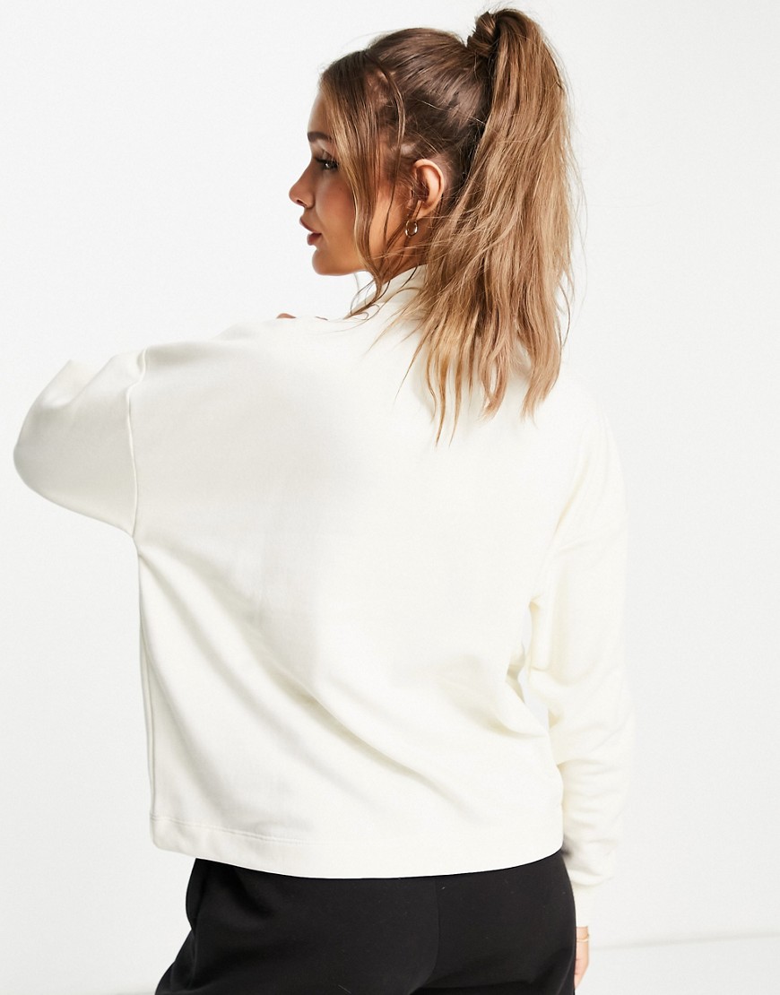 Kremowa-bluza-dresowa-zapinana-na-zamek-defekt-XS-1 Kremowa-bluza-dresowa-zapinana-na-zamek-defekt-XS