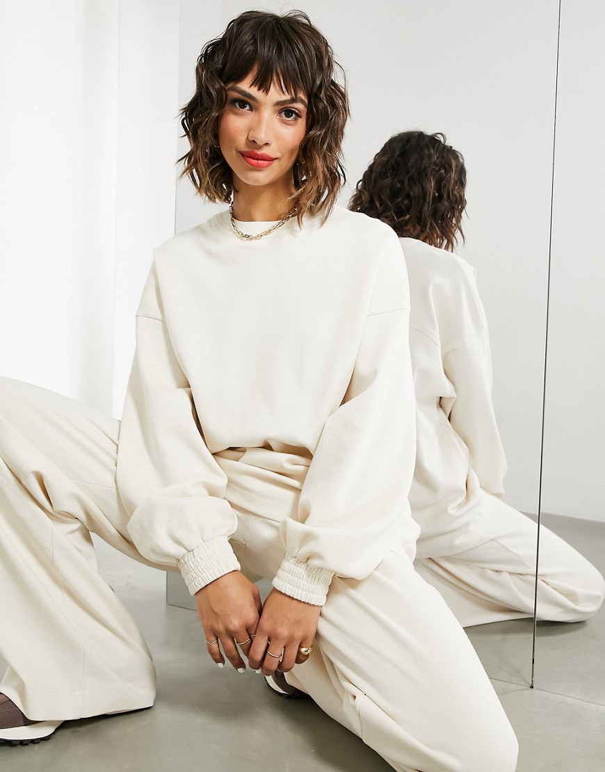 Kremowa-bluza-z-teksturowanego-dzerseju-44-7 Kremowa-bluza--z-teksturowanego-dzerseju-44