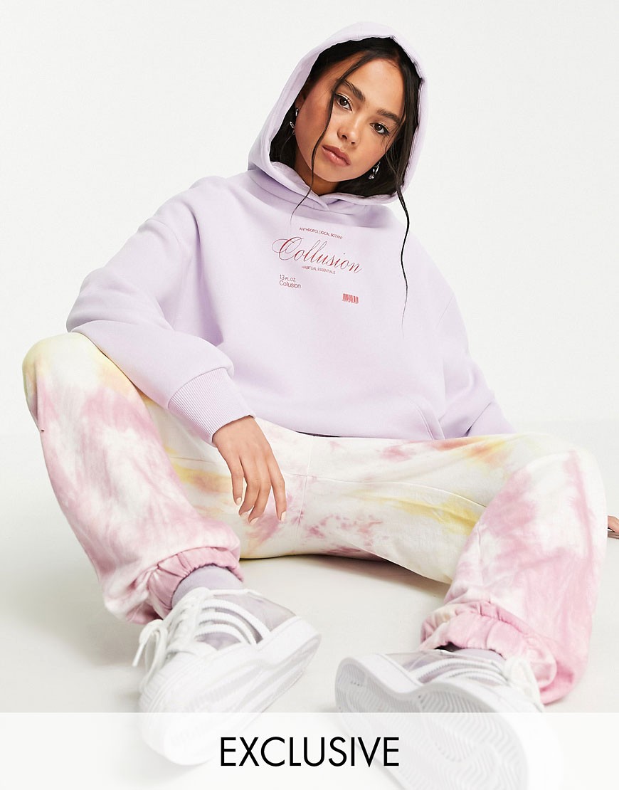 Liliowa damska bluza oversize z kapturem i logo defekt 38 Liliowa-damska-bluza-oversize-z-kapturem-i-logo-defekt-38