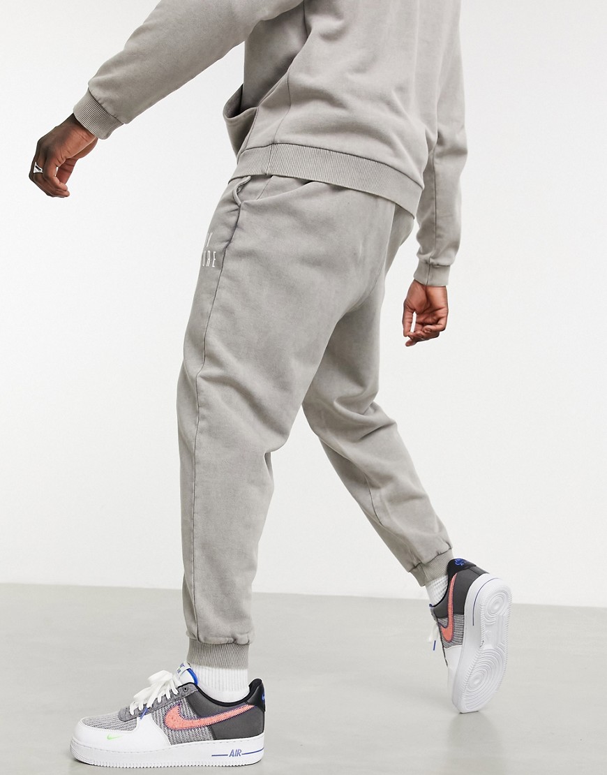 Meskie-rozowo-szare-joggersy-oversize-z-efektem-sprania-M-1 Meskie-rozowo-szare-joggersy-oversize-z-efektem-sprania-M