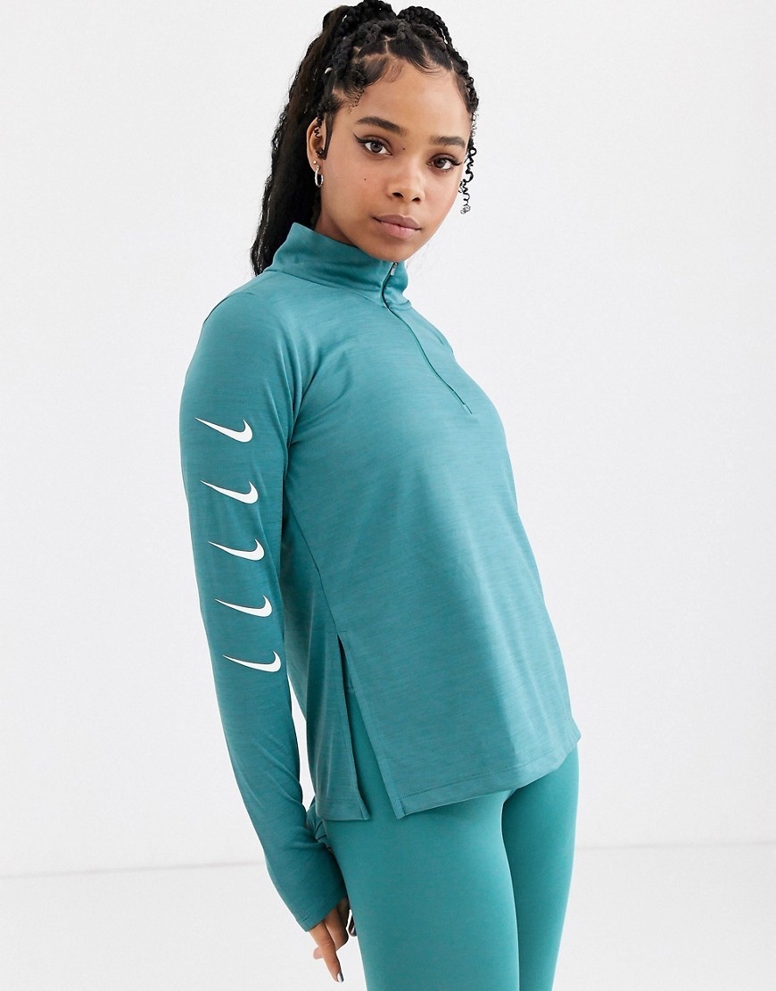 Nike Zielony T-shirt z długim rękawem damski na zamek M 38 Nike-Zielony-T-shirt-z-dlugim-rekawem-damski-na-zamek-M-38