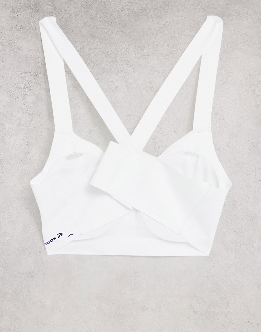 Reebok-bialy-biustonosz-sportowy-ze-skrzyzowanymi-na-plecach-paskami-S-1 Reebok-bialy-biustonosz-sportowy-ze-skrzyzowanymi-na-plecach-paskami-S