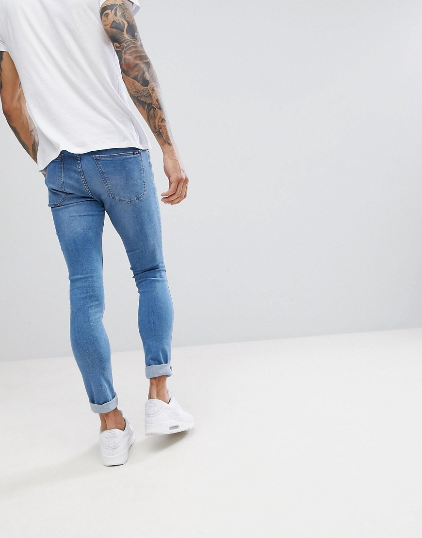 Spodnie-jeansowe-meskie-super-skinny-jasny-niebieski-W29-L32