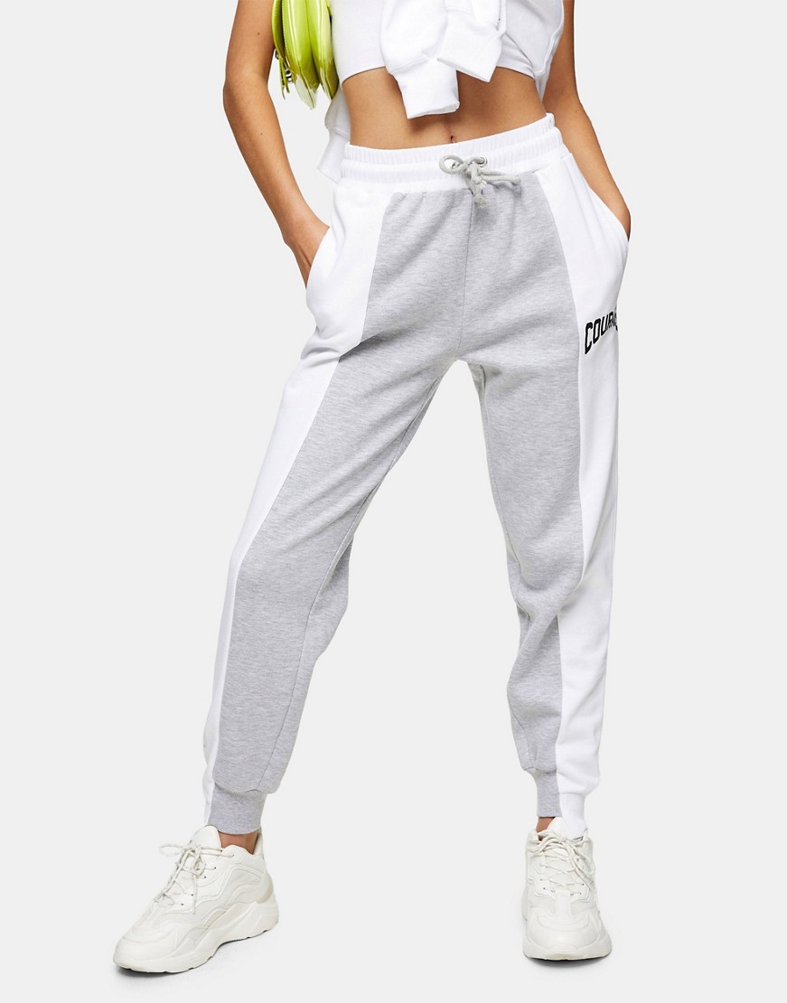 Topshop dwuolorowe joggersy z napisem defekt S Topshop-dwuolorowe-joggersy-z-napisem-S