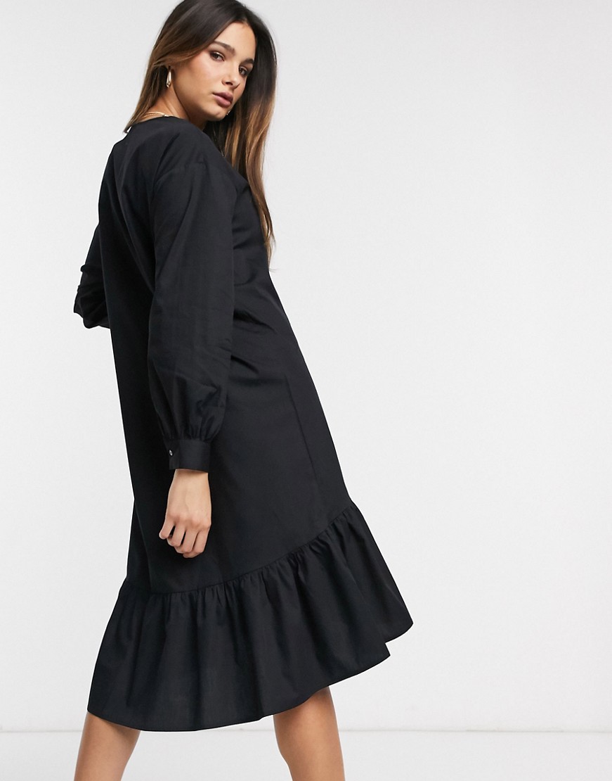 Vero-Moda-czarna-trapewowa-sukienka-z-falbanami-L-1 Vero-Moda-czarna-trapewowa-sukienka-z-falbanami-L