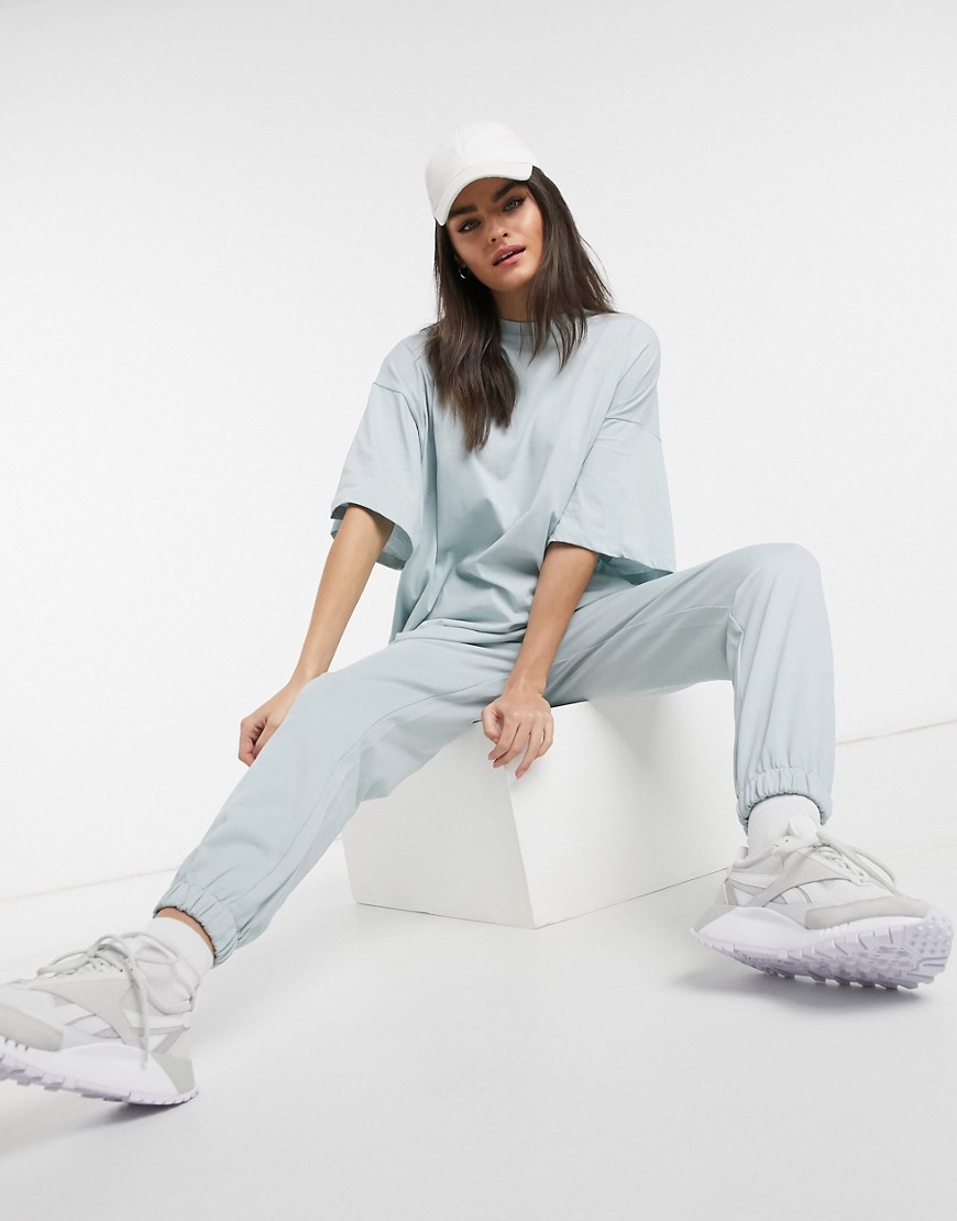 Zielony-damski-t-shirt-oversize-z-nadrukiem-z-boku-defekt-44-3 Zielony-damski-t-shirt-oversize-z-nadrukiem-z-boku-defekt-44