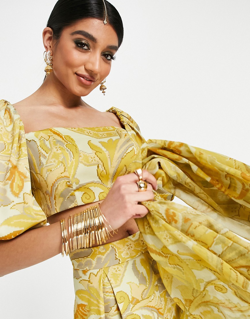 Zolty-drapowany-top-o-krotkim-fasonie-z-odslonietymi-ramionami-i-wzorem-lisci-36-2 Zolty-drapowany-top-o-krotkim-fasonie-z-odslonietymi-ramionami-i-wzorem-lisci-36