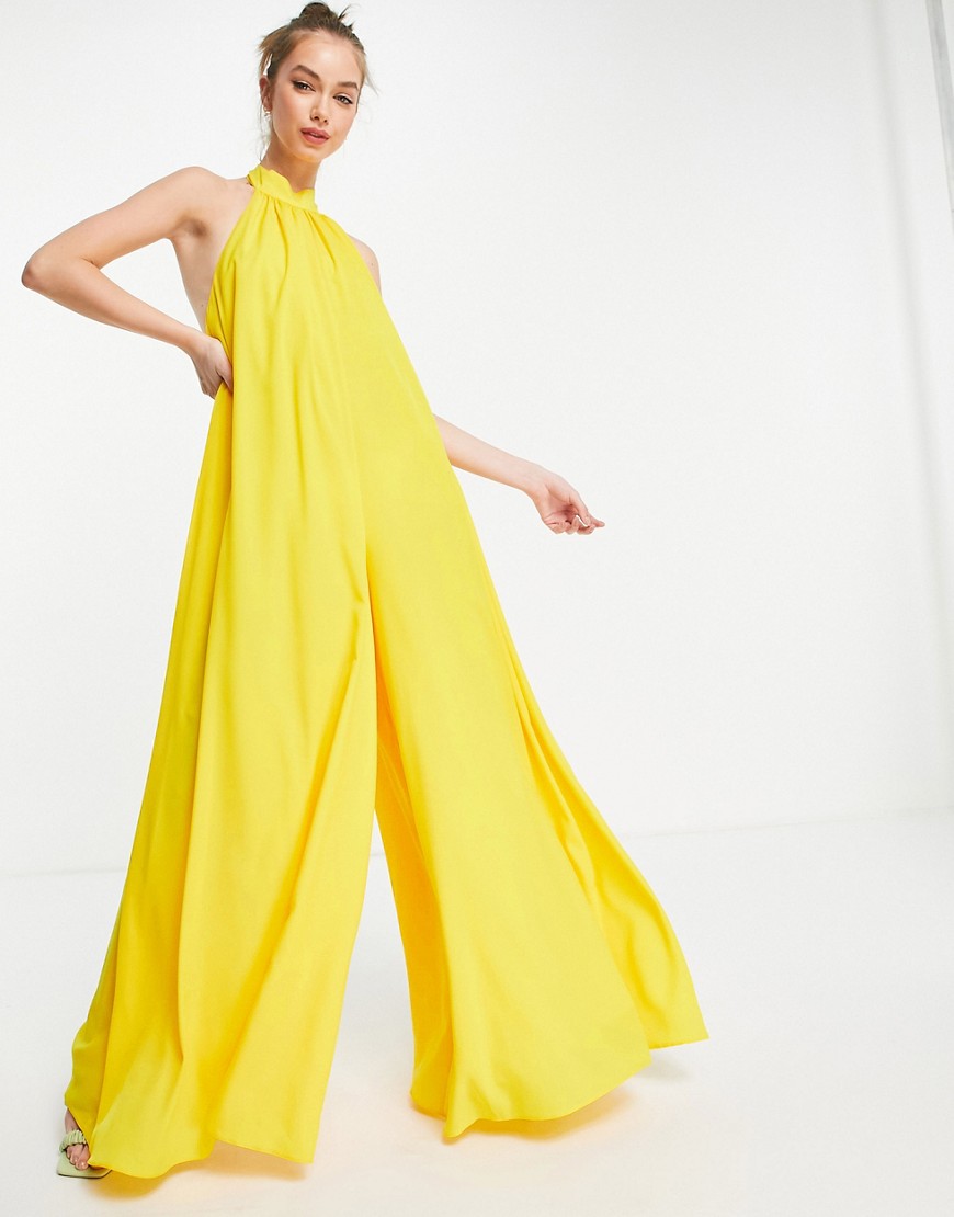 Zolty-kombinezon-z-dekoltem-typu-halter-odkrytymi-plecami-i-szerokimi-nogawkami-XL-3 Zolty-kombinezon-z-dekoltem-typu-halter-odkrytymi-plecami-i-szerokimi-nogawkami-XL
